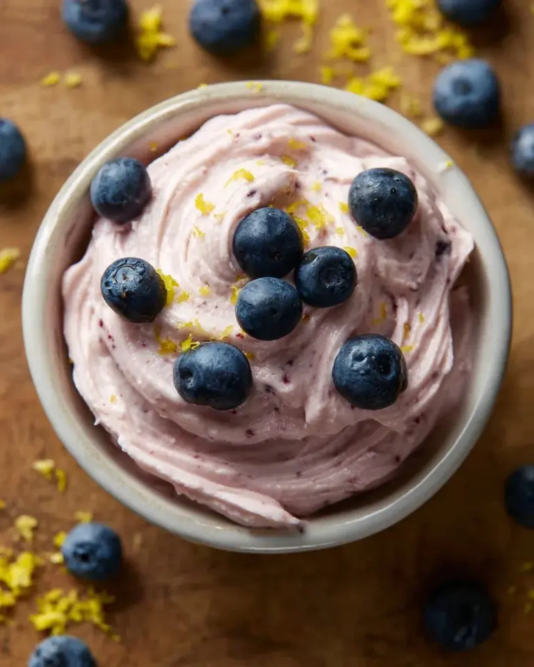 Lemon blueberry butter spread on toast with fresh blueberries