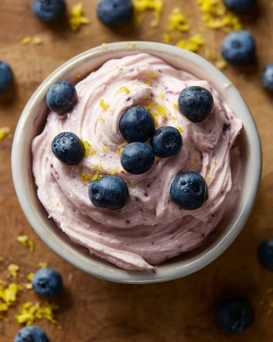 Lemon blueberry butter spread on toast with fresh blueberries