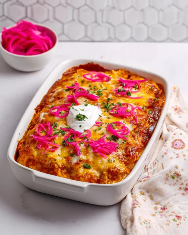 Delicious Chicken Enchilada Casserole served in a baking dish