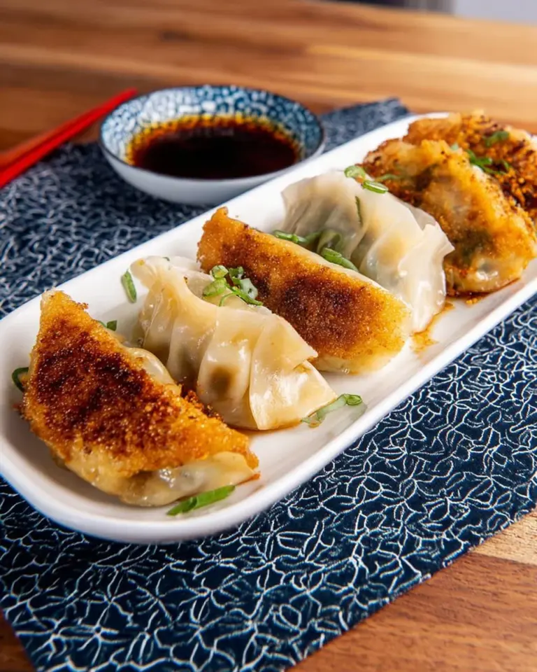 Dumplings filled with juicy umami filling on a plate