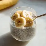 Healthy banana chia pudding served in a bowl with fresh banana slices and chia seeds