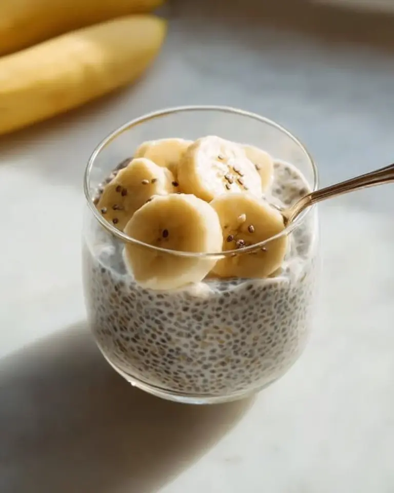 Healthy banana chia pudding served in a bowl with fresh banana slices and chia seeds