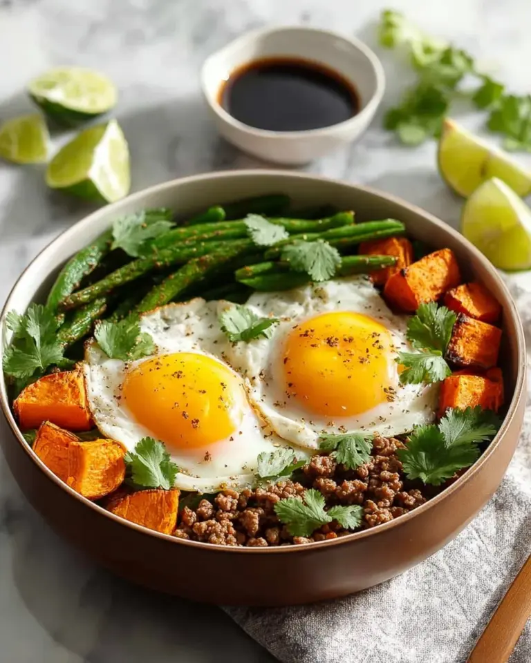 Juicy ground turkey dish with green beans and sweet potato on a plate