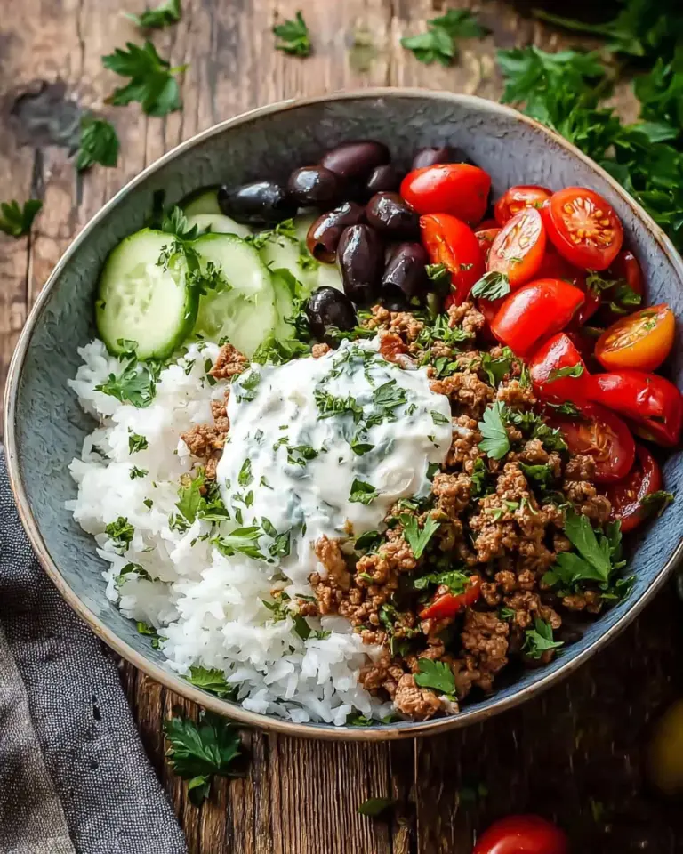Quick Greek Ground Turkey Rice Bowls topped with fresh vegetables and herbs