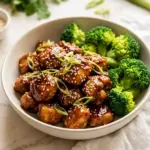 Sheet pan pineapple chicken with broccoli, a quick and flavorful dinner option